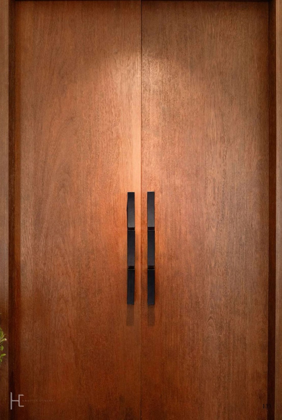 Timber doors with black cast iron pull handles